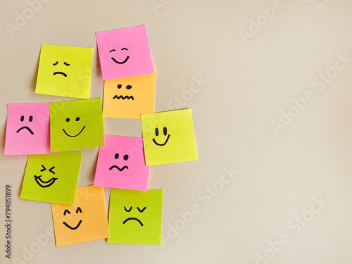Many sticky notes with different sad and happy emotions  . Survey Concept  