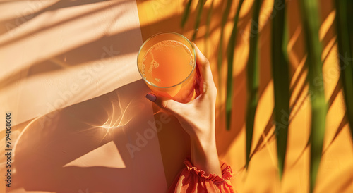 Hello summer season with female hand holding cocktail,fruit drink with decorating by tropical.relaxation and refreshment with holiday summer time.
