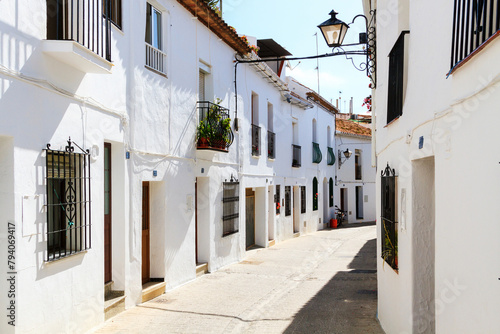 Beautiful street with flowers in the Mijas town, Spain