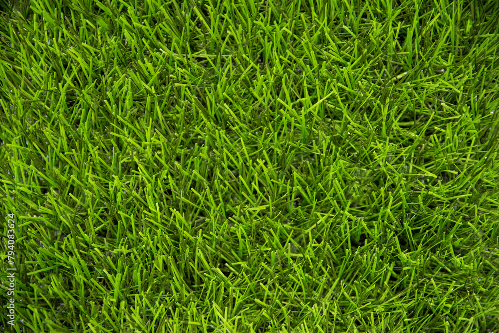 Close up of bright green artificial lawn grass turf Close up of bright green artificial lawn grass turf