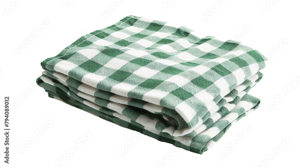 Stack of green and white checkered kitchen towels neatly folded on a white background. Stack of green and white checkered kitchen towels neatly folded on a white background.