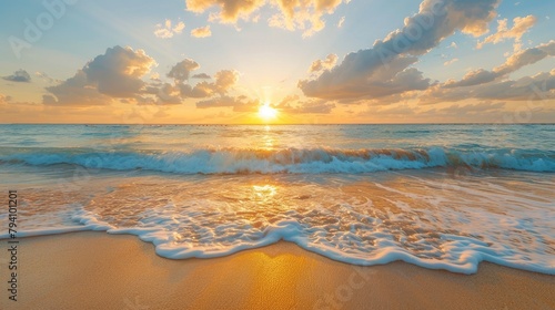 A serene beach at sunset, with the turquoise ocean waves gently lapping against golden sand and colorful clouds in the sky. 