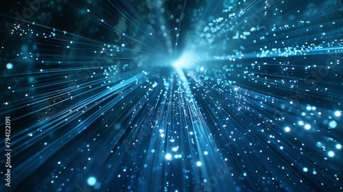 Abstract background. Dynamic blue image depicting numerous light rays and particles radiating from a central bright source.