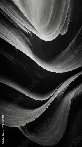 Light illuminates smooth, undulating curves of slot canyon's sandstone walls, creating mesmerizing interplay of light, shadow. Sinuous lines of rock formations draw eye upward, emphasizing narrowness.