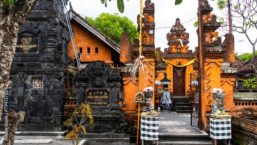 BALI APRIL 2024 – Hindu temple in front of Badung KUMBASARI Market in Denpasar, Bali, Indonesia. photo