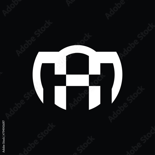 circle logo monogram forming the letters "a" and "m". simple and elegant logo in black and white.