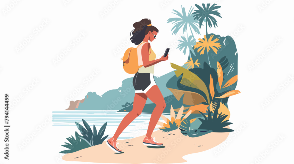 Active lifestyle by the ocean Young woman using a sma
