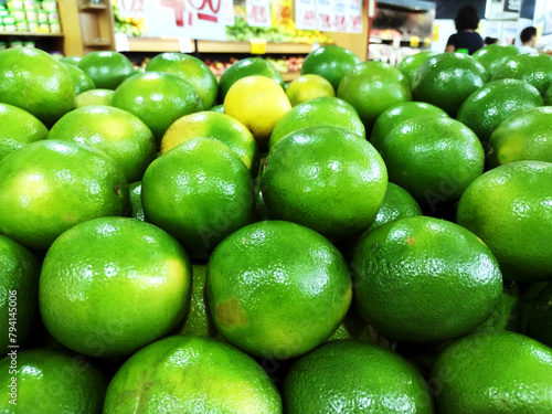 Oranges on the supermarket shelf
 photo