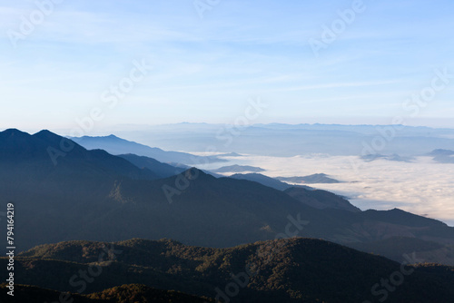 Sea of mist and clouds view from the highest mountain in Thailand. Doi Inthanon National Park. Amazing Nothern Thailand Landscape.