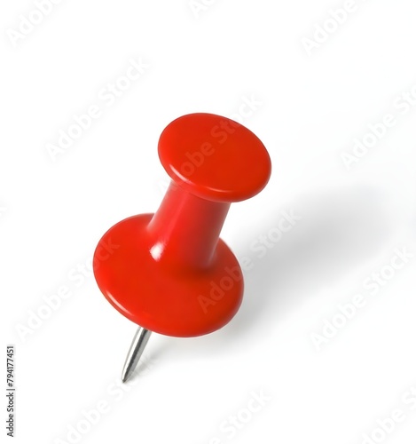A red pushpin on a white background