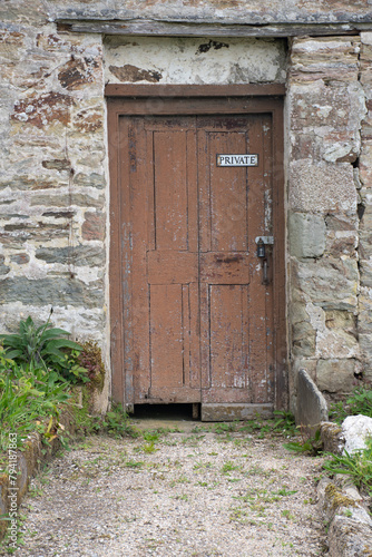 A locked door in a ruin