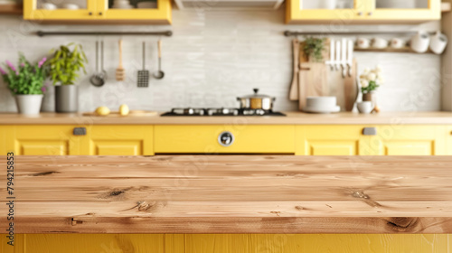 Wooden light empty countertop against the background of modern yellow kitchen, kitchen panel with accessories in the interior. Scene showcase template for promotional items, banner