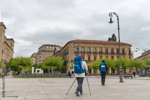 Way of St. James. Pamplona. Couple of pilgrims in the Plaza del Castillo