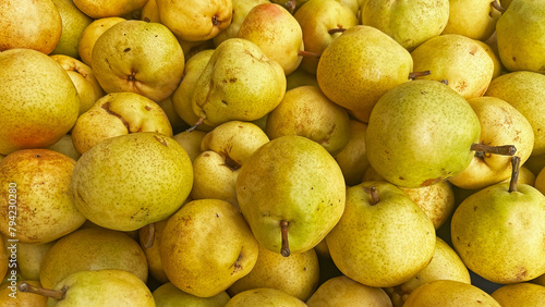 Sweet, organic pears on the market shelf.