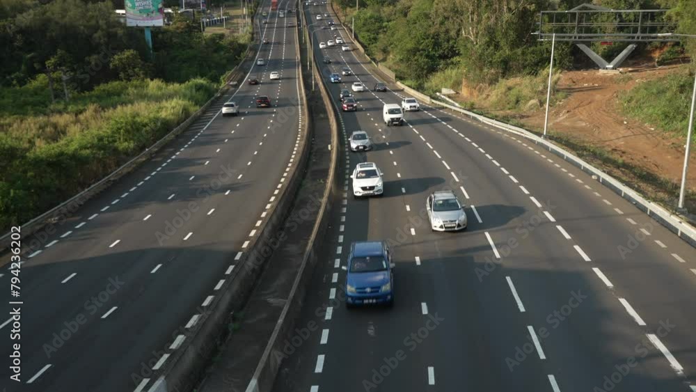 View of traffic on major route and Long Mountain range, Quatre Bornes, Mauritius, Indian Ocean, Africa View of traffic on major route and Long Mountain range, Quatre Bornes, Mauritius, Indian Ocean, Africa