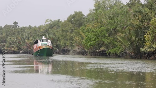 Tourist boat inside the Sundarbans.this HD video was taken from sundarbans national park,Bangladesh.