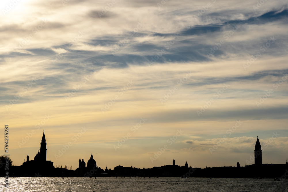 Fototapeta premium Venice, Italy: the city skyline at sunset time in spring