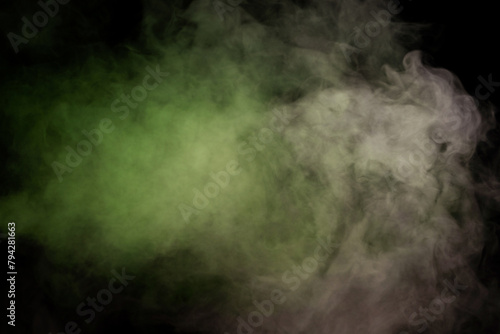 Green and white steam on a black background.