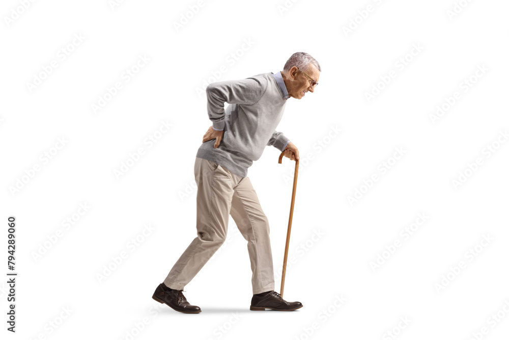 Full length profile shot of an elderly man walking with a bent back Full length profile shot of an elderly man walking with a bent back