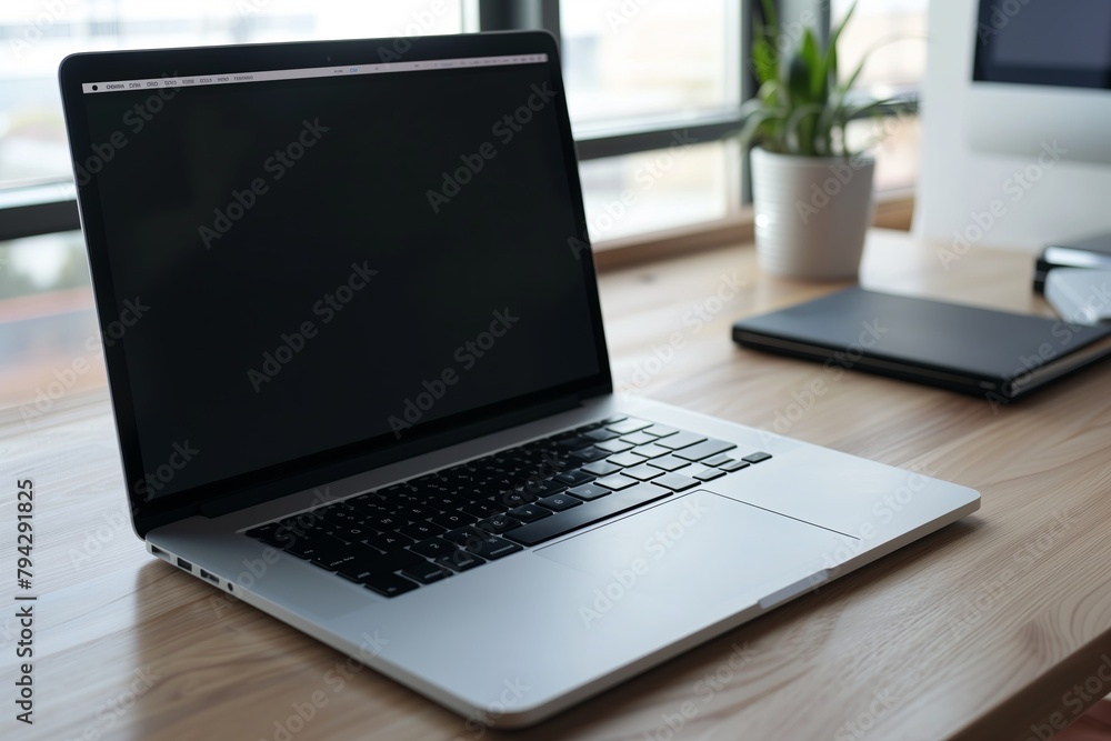 Modern workplace of manager with laptop and documents in modern office Modern workplace of manager with laptop and documents in modern office