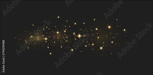 Gold sparks and golden stars glitter special light effect. Vector sparkles on transparent background. Christmas abstract. dust