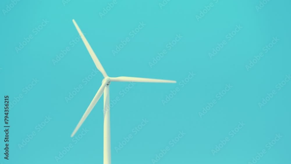 Wind turbine windmill in rotation, power generator against blue sky. Generating electricity. Ecology, conservation and sustainable energy. Wind turbine windmill in rotation, power generator against blue sky. Generating electricity. Ecology, conservation and sustainable energy.