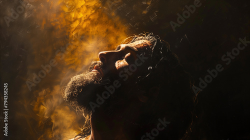 From a low angle, Jesus' face is illuminated by divine light as he prays fervently, his expression reflecting inner peace and devotion to his heavenly Father. photo