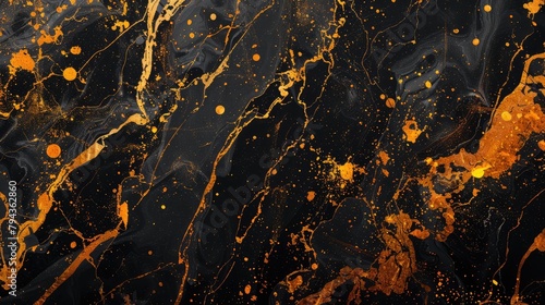 Black abstract marble background with splashes and orange lines