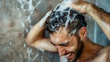 Man joyfully shampooing his hair in the shower