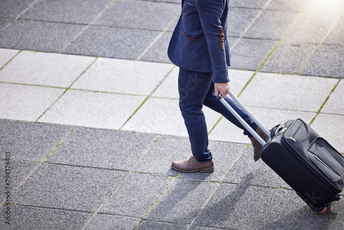 Business man  city and suitcase for travel to airport  employee and trip for global opportunity. Male person  walking and above for journey  luggage and commute to hotel or immigration for career