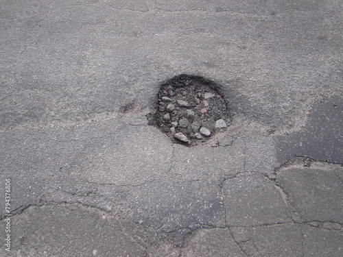 Obraz na płótnie Old asphalt road pothole pit
