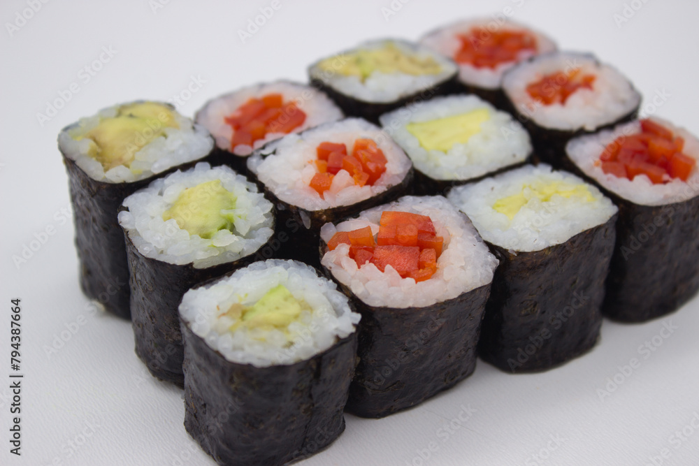 Vibrant Veggie Sushi Maki on White Backdrop Vibrant Veggie Sushi Maki on White Backdrop