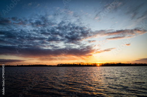 Beautiful April sunset over the lake