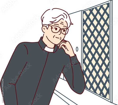 фотографія Man catholic priest listens to confession, located in church in room with mesh wall