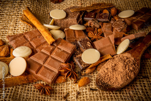 Variety of chocolate, light and dark with white chocolate and spices