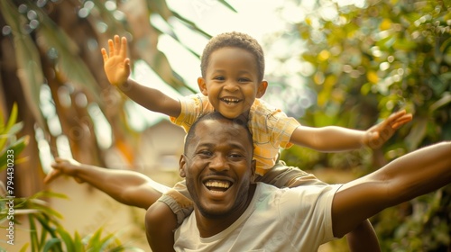 Airplane, garden, or youngster playing with father to relax or bond as a black family, Smile, flying or happy African parent with kid can play enjoyable backyard games on holiday.