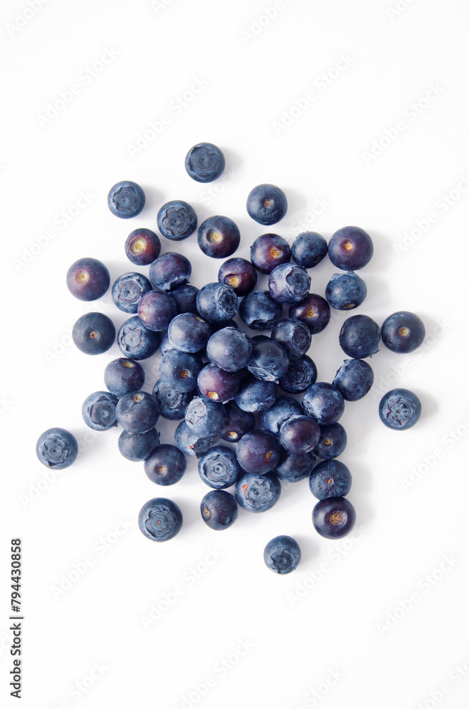 Blueberries on white background. Top view. Blueberries on white background. Top view.