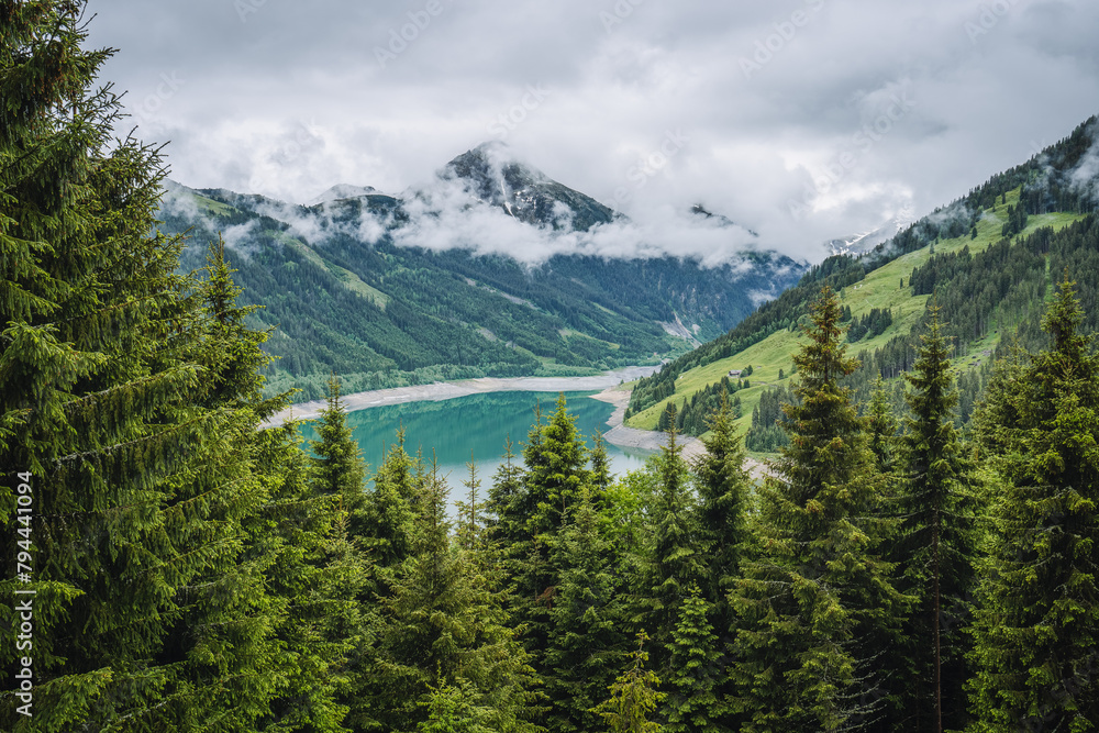 Schlegeis Stausee lake view from mountain hiking path trail. Zillertal, Austria, Europe