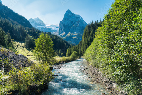 View of Rosenlaui with wellhorn and Reichenbach river in summer at Bern, Switzerland