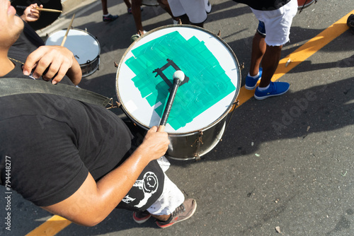Musicians are seen playing percussion instruments during Fuzue, pre-carnival in the city of Salvador, Bahia. photo