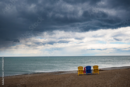 Canvas Print dramatic storm clouds  over the beach room for text shot kew beach toronto in sp