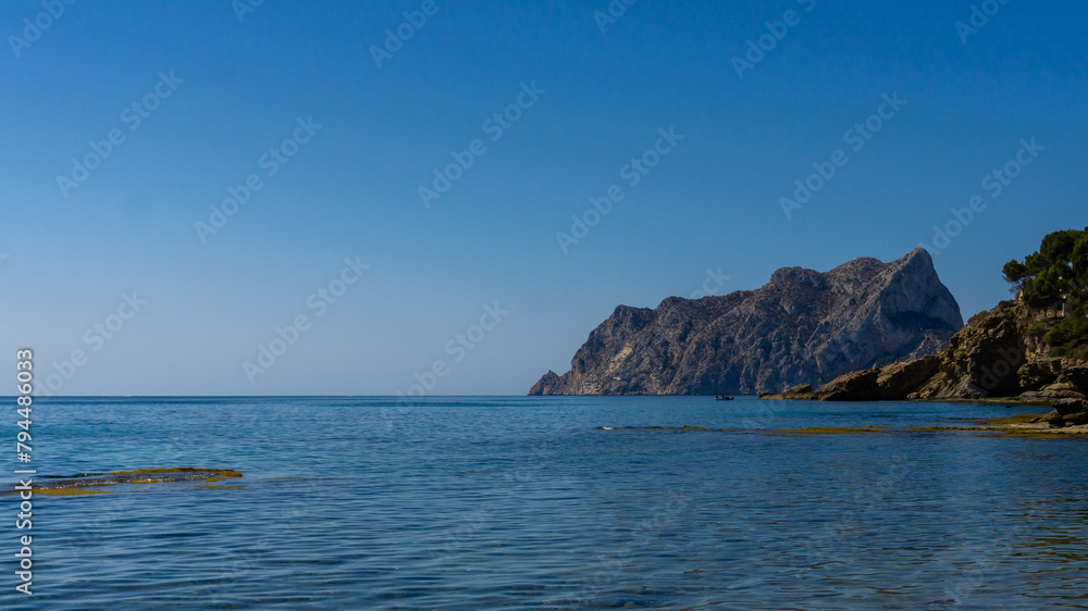 Penyal d Ifac in Calpe from Ecological walk in Benissa, Alicante province, Spain. Image for blog or travel guide with copy space. Penon de Ifach. High quality photo Penyal d Ifac in Calpe from Ecological walk in Benissa, Alicante province, Spain. Image for blog or travel guide with copy space. Penon de Ifach. High quality photo
