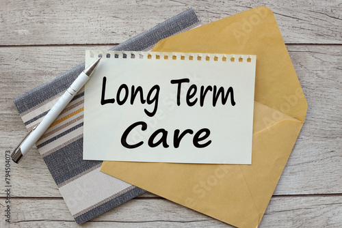 Wallpaper Mural sheet of paper on an envelope on a red notepad. calendar. text long term care Torontodigital.ca