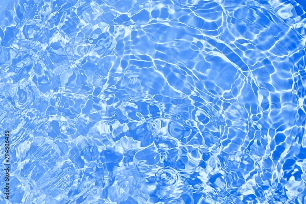 blue wavy water texture for summer background. Transparent blue clear water surface texture. Water waves in sunlight on swimming pool. Water surface with rings and ripples top view. Summer background blue wavy water texture for summer background. Transparent blue clear water surface texture. Water waves in sunlight on swimming pool. Water surface with rings and ripples top view. Summer background