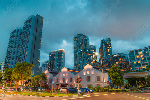 Photography General view from Singapore skyscrapers and flats among green streets during twi