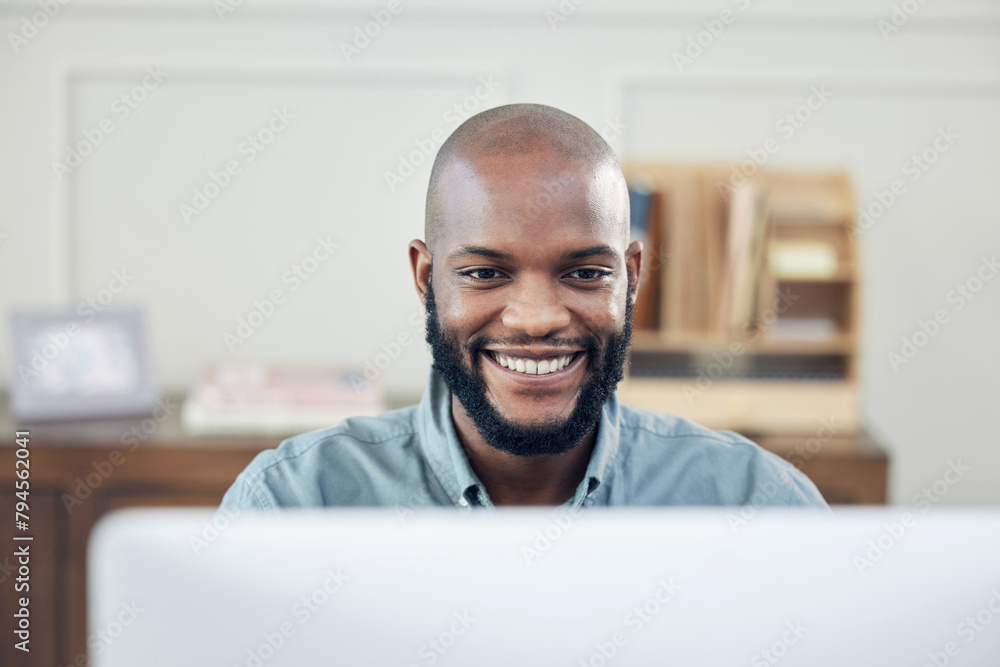 Black man, smile and freelance at computer in home office for business, admin and copywriting at desk. African person, pleased and working in house or apartment for task, planning or networking at PC Black man, smile and freelance at computer in home office for business, admin and copywriting at desk. African person, pleased and working in house or apartment for task, planning or networking at PC