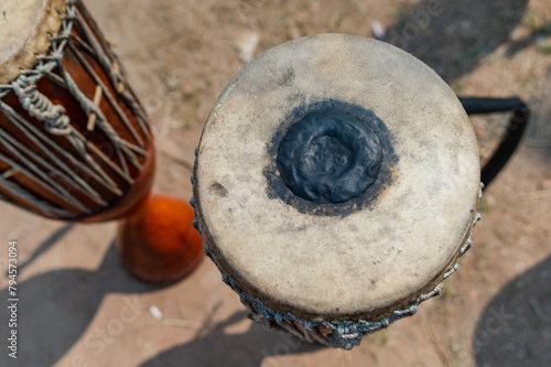 Close-up high angle shot of a long leather drum from Isaan, a traditional musical instrument in Thailand.