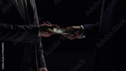 Illegal transfer of money and bribery in close-up, the concept of crime