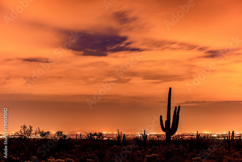 Phoenix city lights reflect off of a low cloud layer at night © Scott Bufkin