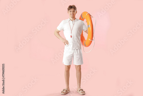 Male lifeguard with whistle...
